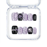 Naillover Singapore handmade press on nails in short square shape featuring black and purple tones, heart gems, and cute kawaii accents
